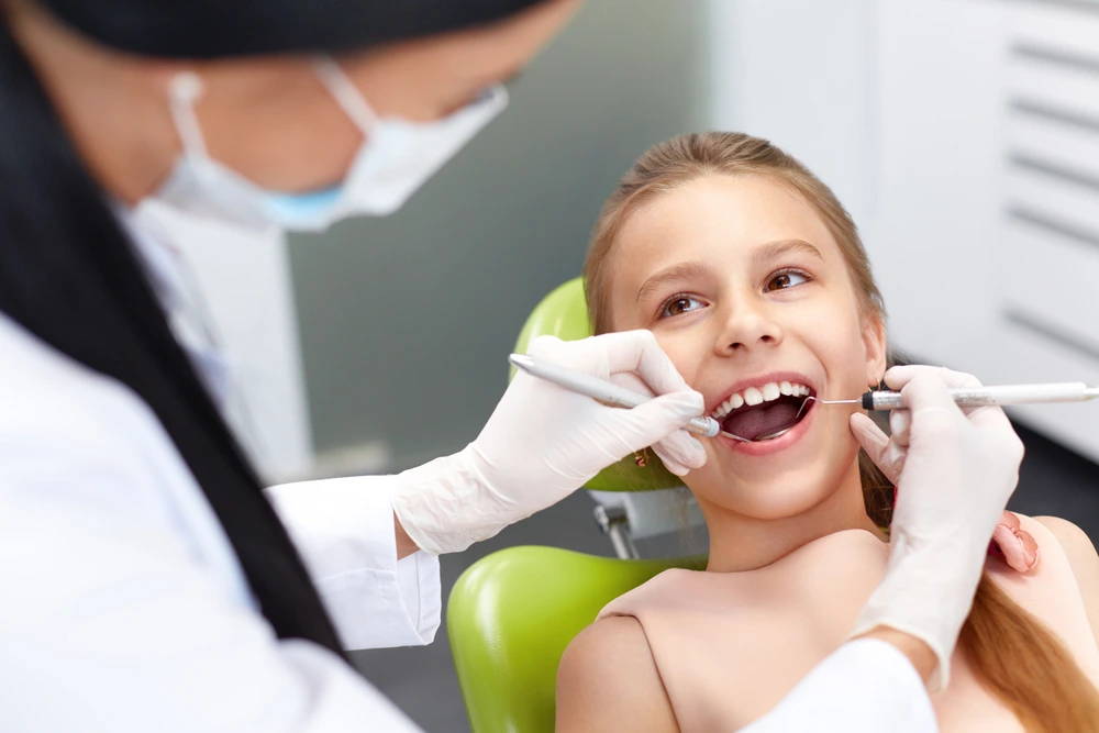Clearly Dental Camden dentist checking the patient teeth